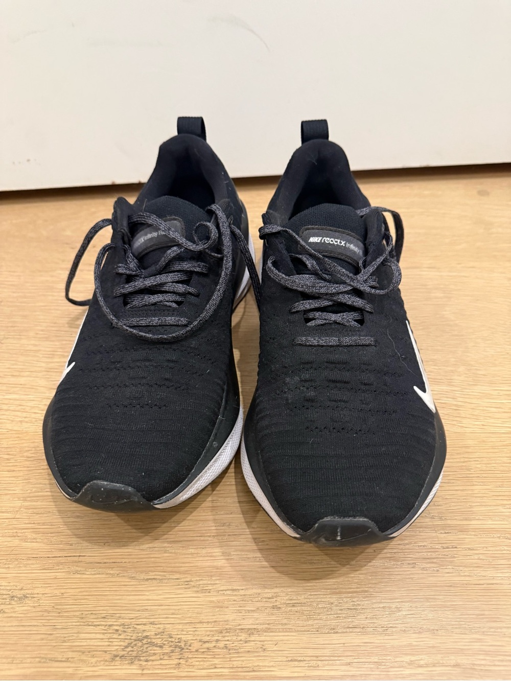 Nike Men's Black Athletic Runners with White Swoosh